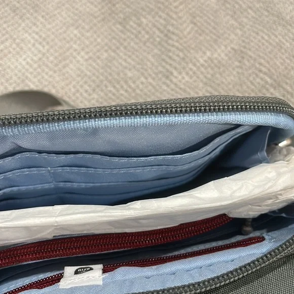 Baggallini. Brand new with tags. Grey with subtle cheetah print background. - Picture 8 of 12